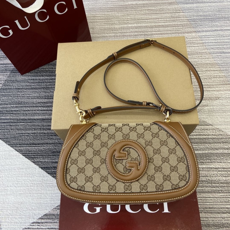 G*u*i top handle bags